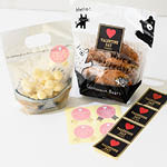 フォトプリントとグラットンファミリーのイラストが入ったジップ付きスタンドバッグを使ったバレンタイン・ホワイトデイラッピング